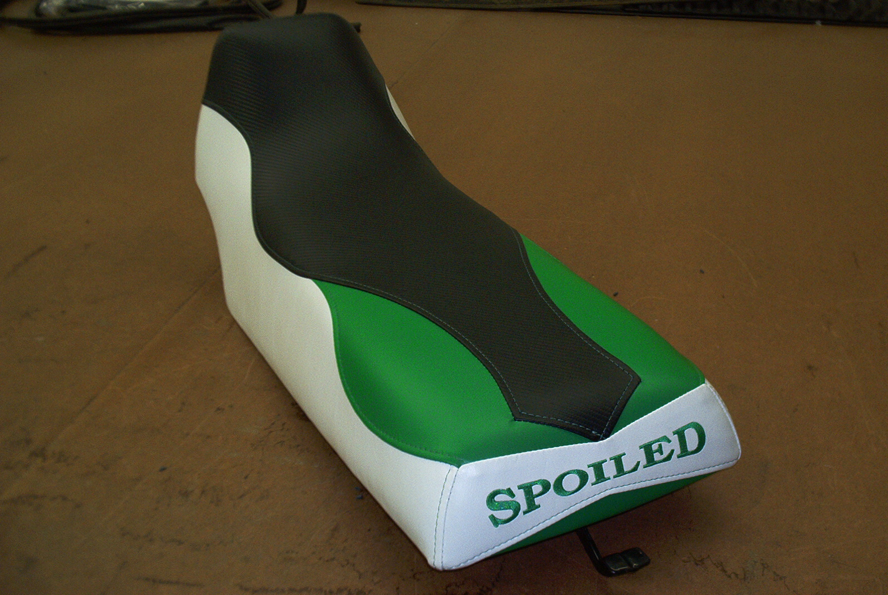 Green, white and black Yamaha Banshee seat