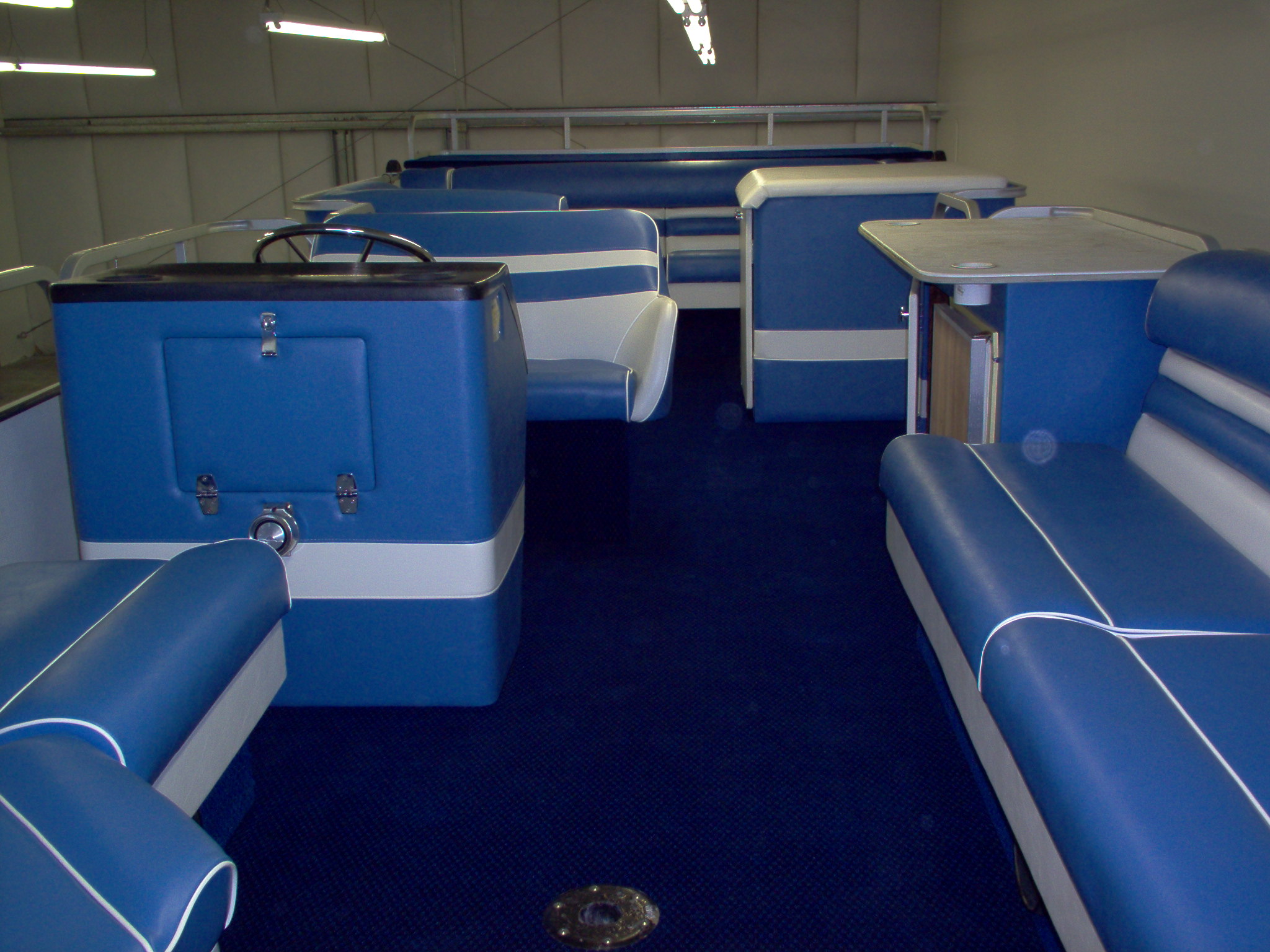Blue and white pontoon boat interior