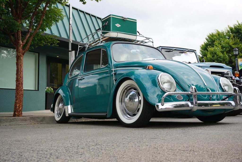1965 VW Beetle in teal with a roof rack
