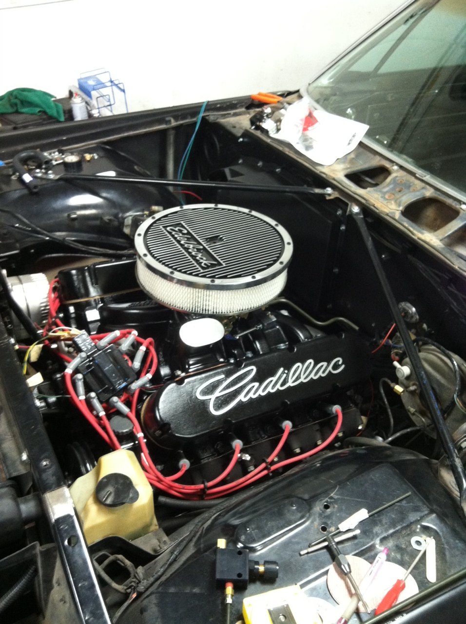Cadillac V8 in for service: Cadillac script valve covers, Edelbrock air cleaner and red plug wires